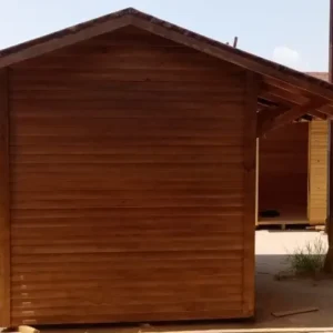 Arkası olarak çekilmiş bahçe depolama evi görseli